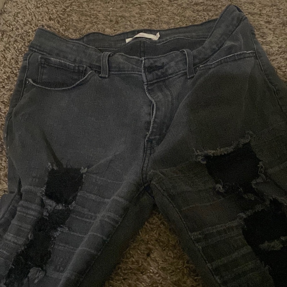 Black Jeans with Rips.